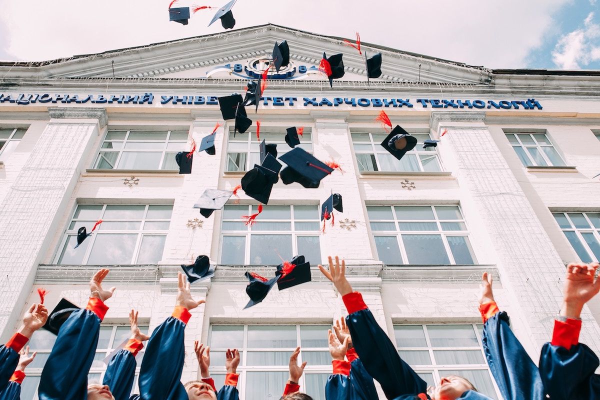 college hats thrown in air